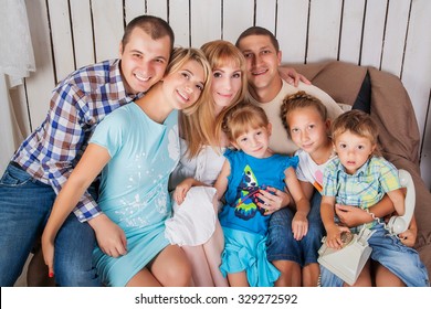 Big Happy Family Sitting On Couch