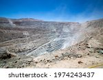 Big haul truck and machinery working in Chuquicamata, biggest open pit copper mine of the world, Calama, Chile