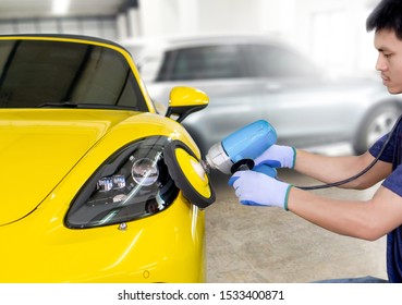 Big headlight cleaning with power buffer machine at service station ,Before cleaning