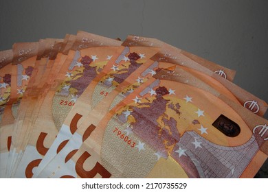 Big heap of 50 euros bilBig heap of 50 euros bills spreaded over a table. High quality photo