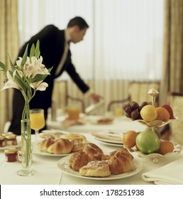 Big Hotel Room Service Continental Breakfast With Waitress Out Of Focus 