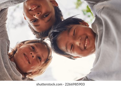 Big hugs. Meeting of tree interracial Caucasian African American and Asian friends. Generation z teenagers hugging. Spending quality time outdoors. Summer time. Bottom view. Underside view - Shutterstock ID 2266985903