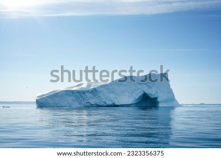 Big iceberg floating in sea near Greenland
