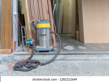 Big Industrial Vacuum Cleaner In Wood Work Shop