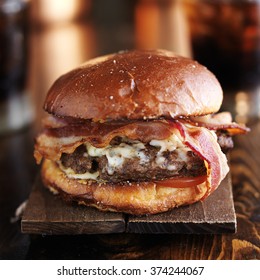 Big Juicy Burger With Bacon And Melted Pepper Jack Cheese