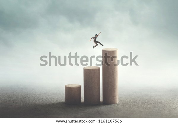 big jump to reach\
the top, success concept
