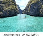 Big Lagoon Philippines, located in El Nido Palawan. Stunning mounting karst cliffs enclose the lagoon, and the water is emerald-clear, perfect for kayaking and swimming.