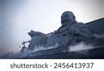 Big laughing buddha statue by sandstone pieces, The Maitreya Bodhisattva statue at Ba Den Mountain in Vietnam