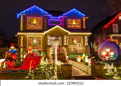 Big Luxury House Decorated And Lighted For Christmas And For New Year Eve At Night At Vancouver, Canada.