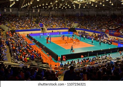 Big Match Of Volleyball Game And Cheering Teems In Indoor Stadium