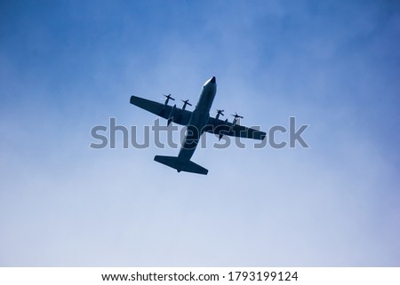 Big Military Transport Cargo Aircraft over sky