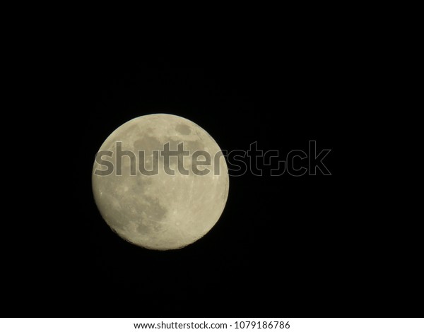 big moon in the
night sky without clouds