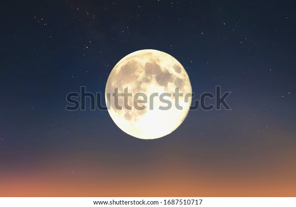 big moon on sunset starry sky  pink and blue\
moonlight  light nature  background\
