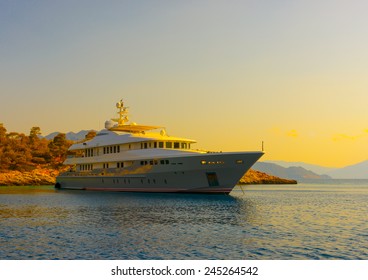 big motor yacht anchored at Agkistri island in Greece - Powered by Shutterstock