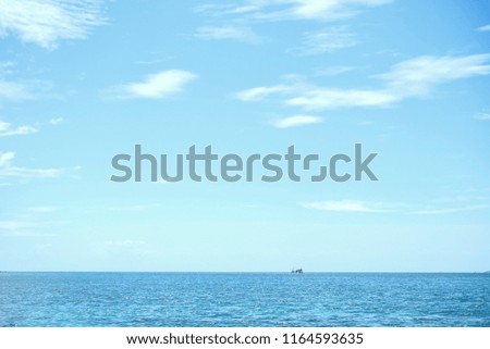 Similar – woman in red swimsuit walks by the sea. blurred