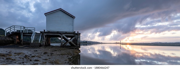 Big Omaha Wharf At Whangateau NZ. A Large Panoramic Of The Wharf And The Estuary At Dawn