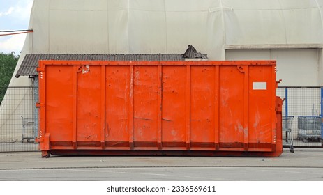Big Orange Roll Off Dumpster Industrial Waste Management - Shutterstock ID 2336569611