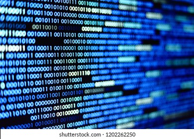 Big overload blockchain data. Blue binary data code background for internet and cyberspace security function. one and zero text on LED moniter screen.