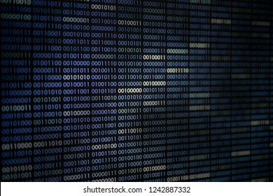 Big overload blockchain data. Blue binary data code background for internet and cyberspace security function. one and zero text on LED moniter screen.