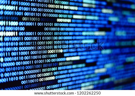 Big overload blockchain data. Blue binary data code background for internet and cyberspace security function. one and zero text on LED moniter screen.