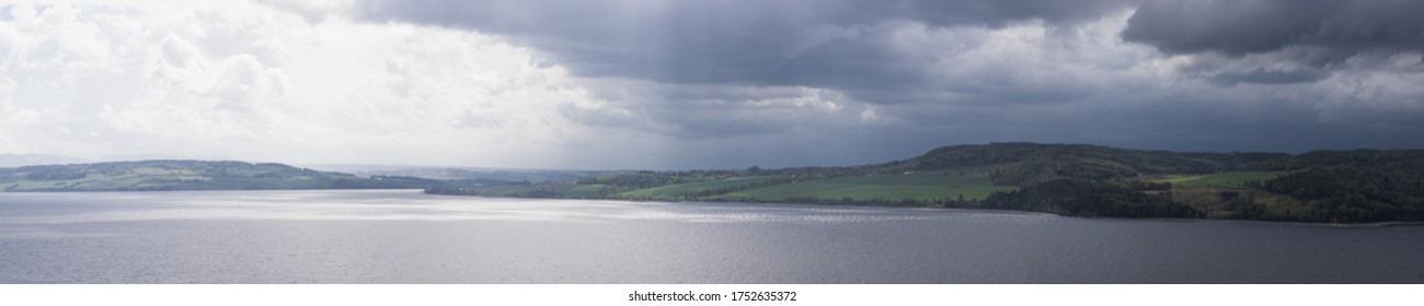 Big Panorama Of Mjøsa, The Biggest Lake In Norway. Seen From Hamar Area Towards Nes And Helgøya.