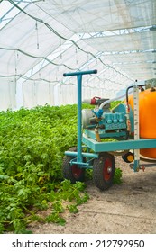 Big Pesticide Sprayer In Greenhouse Close Up View