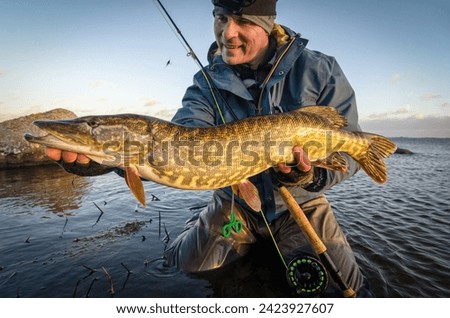 Big pike caught on fly rod in February