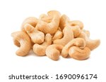 Big pile of cashew nuts isolated on white background. Package design element with clipping path