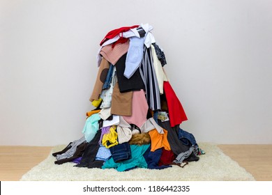 Big pile of clothes on the floor