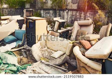 Big pile of old broken furnitures