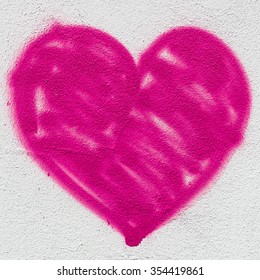 A Big Pink Heart, Painted On The Wall With Spray Paint.