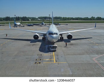 Big plane's front side view on the airport