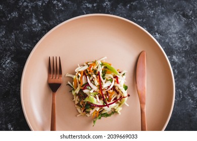 Big Plate With Small Amount Of Salad In The Centre, Concept Of Dieting And Calorie Restrictions