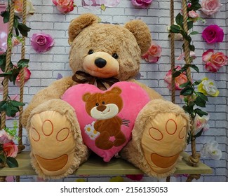 Big Plush Toy Brown Teddy Bear Holding Pink Heart Shape Pillow In Shop, Romantic Gift In Valentines Day