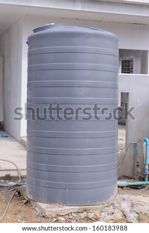 Big polyethylene container on construction site, prepare to installation