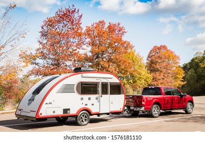 Big Pool, MD / USA
Nov 17, 2019
Pickup Truck Hauling Camp Trailer On A MD Highway