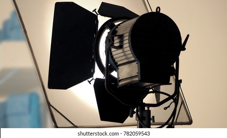 Big production spot light equipment in studio for video or film movie shooting and low angle view. - Shutterstock ID 782059543