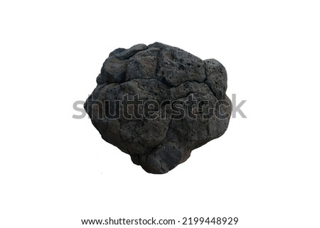 A big raw specimen of dark basalt rock isolated on white background. Extrusive igneous (volcanic) rock.