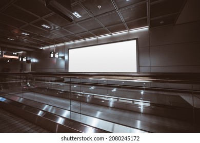 A Big Rectangular Glowing Blank Neon Billboard Template Near Two Travelators Of A Modern Dark Airport Terminal; A Mockup Of An Empty White Banner Indoors Of A Shopping Mall Next To Two Moving Walkways