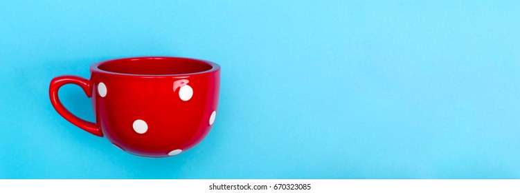 Big Red Coffee Mug On A Bright Blue Background