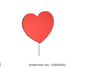 Big red heart shaped street sign isolated on white background