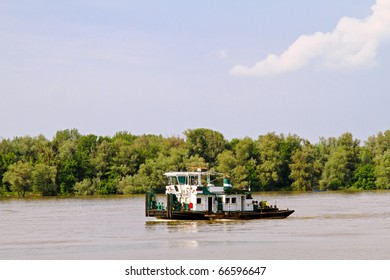 Big River Tugboat Surfing On The Water