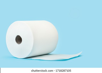 A Big Roll Of Paper Towels On A Blue Background