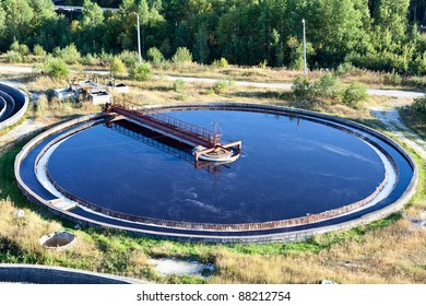 Big Round Sedimentation Drainage. Water Settling, Purification In The Tank By Biological Organisms On Water Station. Close Up