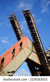 The Big Rusty Metal Structures In An Abandoned Old Industrial Factory