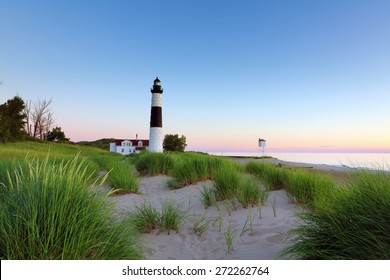 Big Sable Point Lighthouse in Ludington State Park on a Lake Michigan beach. Sunset hues in the background. - Shutterstock ID 272262764
