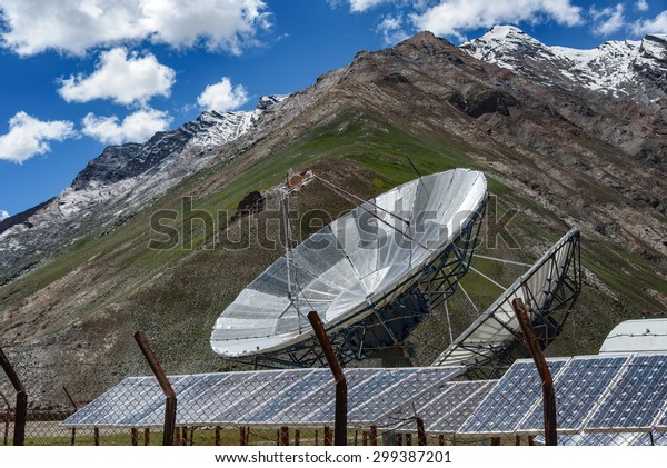 Big satellite dishes antena and solar\
panels at Rangdum, Padum, Zanskar valley,\
India.