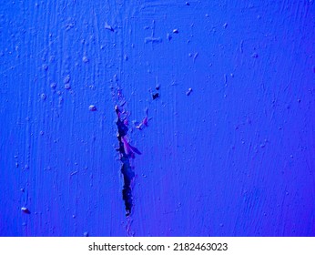 Big Scratch On The Wall With Blue Paint.Abstract Surface From Damaged Old Blue Paint.