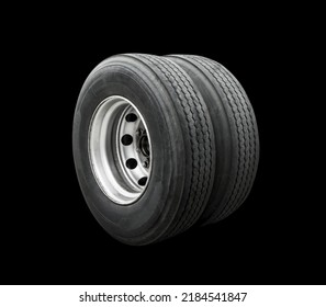 Big Semi Truck Wheels Tires Isolated On Black. Rubber, Truck Tyres. Freight Trucks Transport Logistics.	