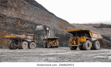 Big Shove at the mining site. The big dump truck or Haul truck is mining machinery, shovels loading of Materials